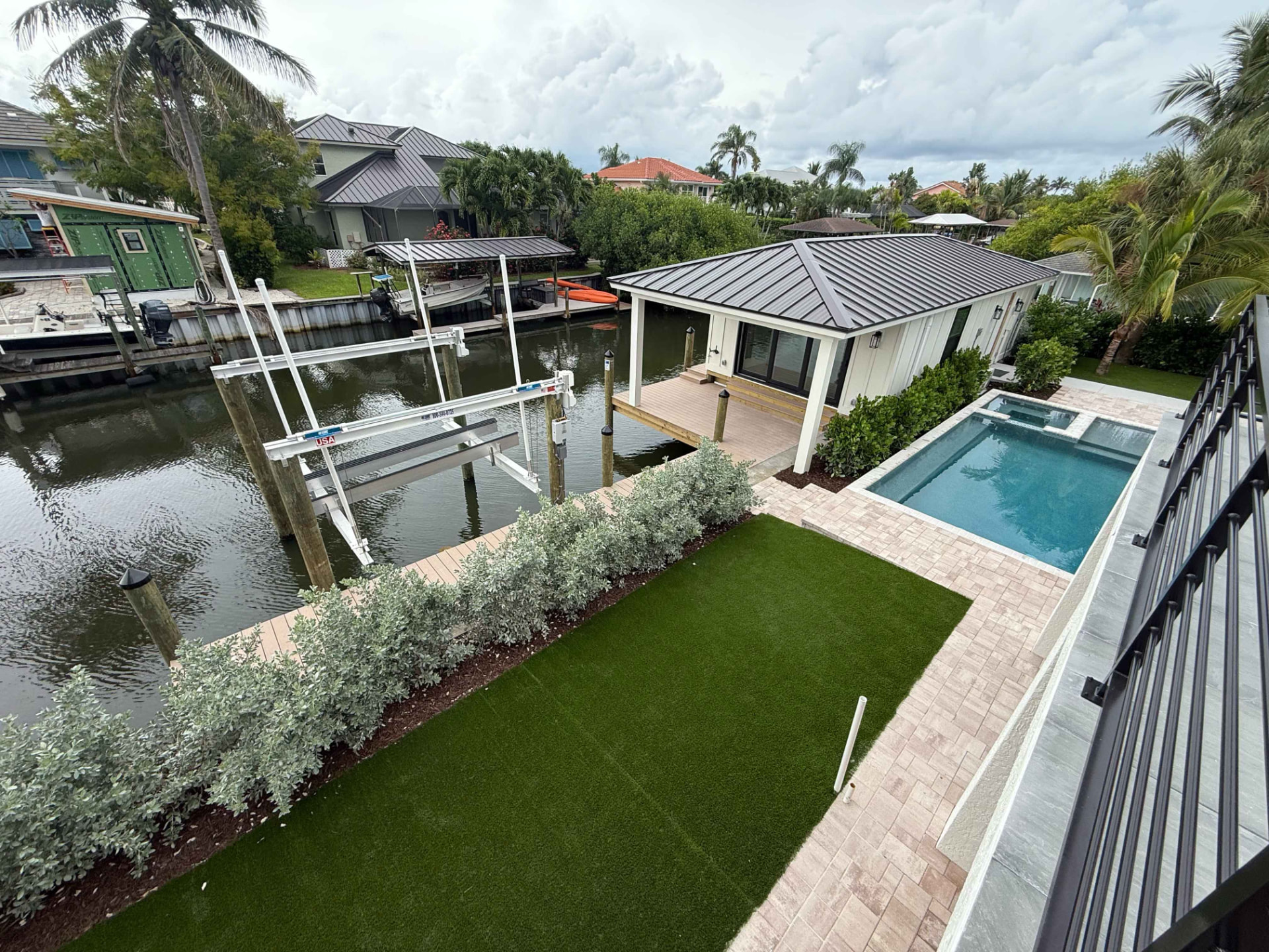 Canal Estate — Dock, Lift & Pool Deck